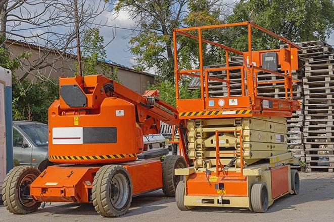 forklift moving pallets of inventory in a warehouse in Chantilly